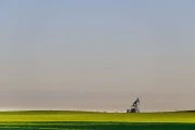 Lone pump jack in a field